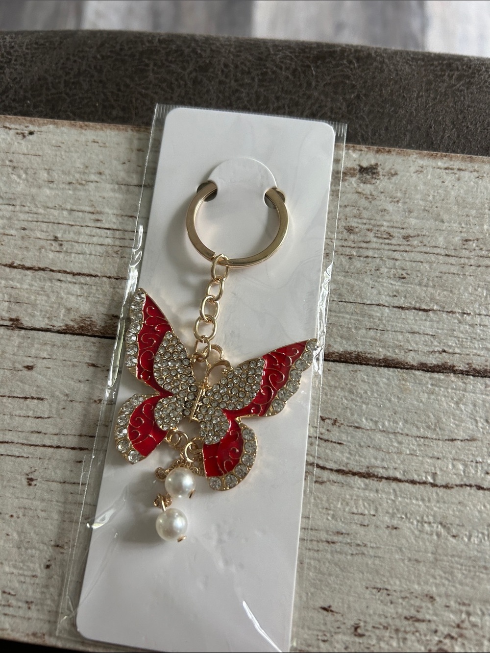 5/)25 Gold Butterfly Keychain with Red Enamel & Pearl Charms